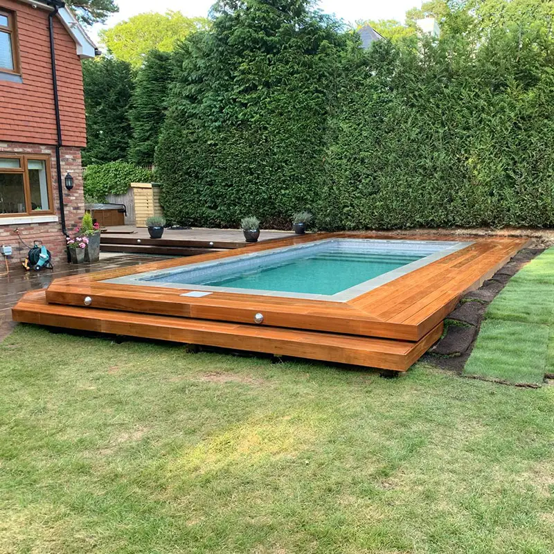 Hardwood decking Kingston - pool surround and steps Hardwood decking Kingston - timber pool surround with wide steps and inset lights