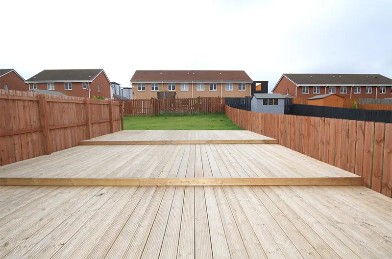 Multi-level patio decking in a London garden — professional installation by MJ Kloss Carpentry